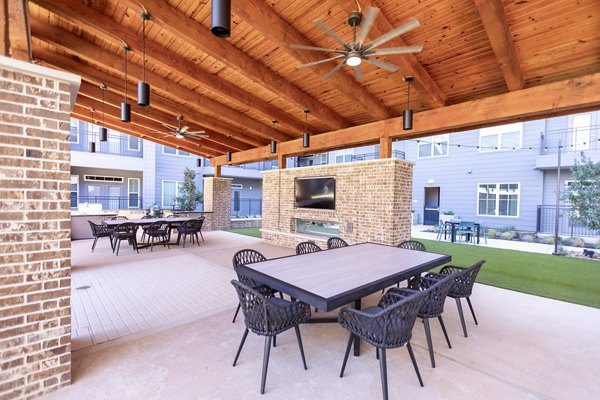 fire pit/patio at Lenox at the Grid Apartments