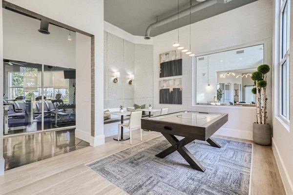 Avantus Apartments: Modern clubhouse with stylish seating and open layout in a luxury apartment community