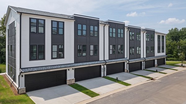 Gladwen Wendell Falls Apartments: Modern building showcasing luxury apartments in a suburban community setting