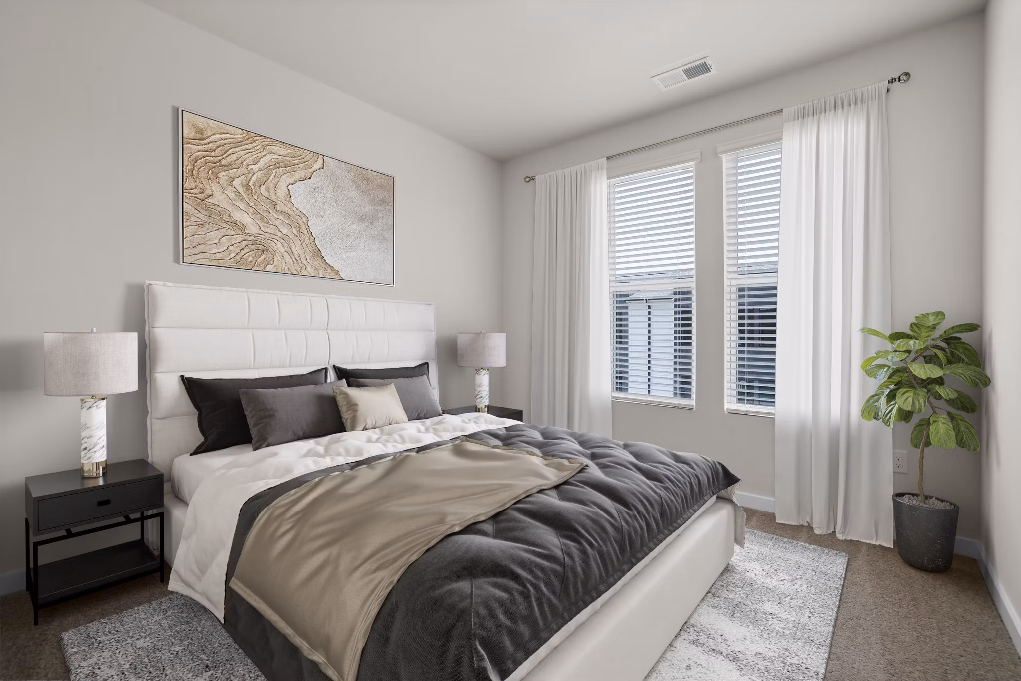 Cozy bedroom with modern decor at Gladwen Wendell Falls Apartments, Greystar luxury apartments