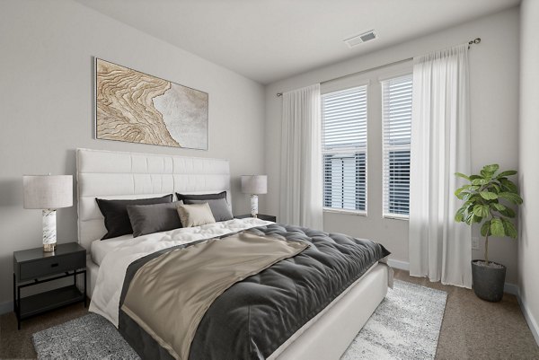 Cozy bedroom with modern decor at Gladwen Wendell Falls Apartments, Greystar luxury apartments