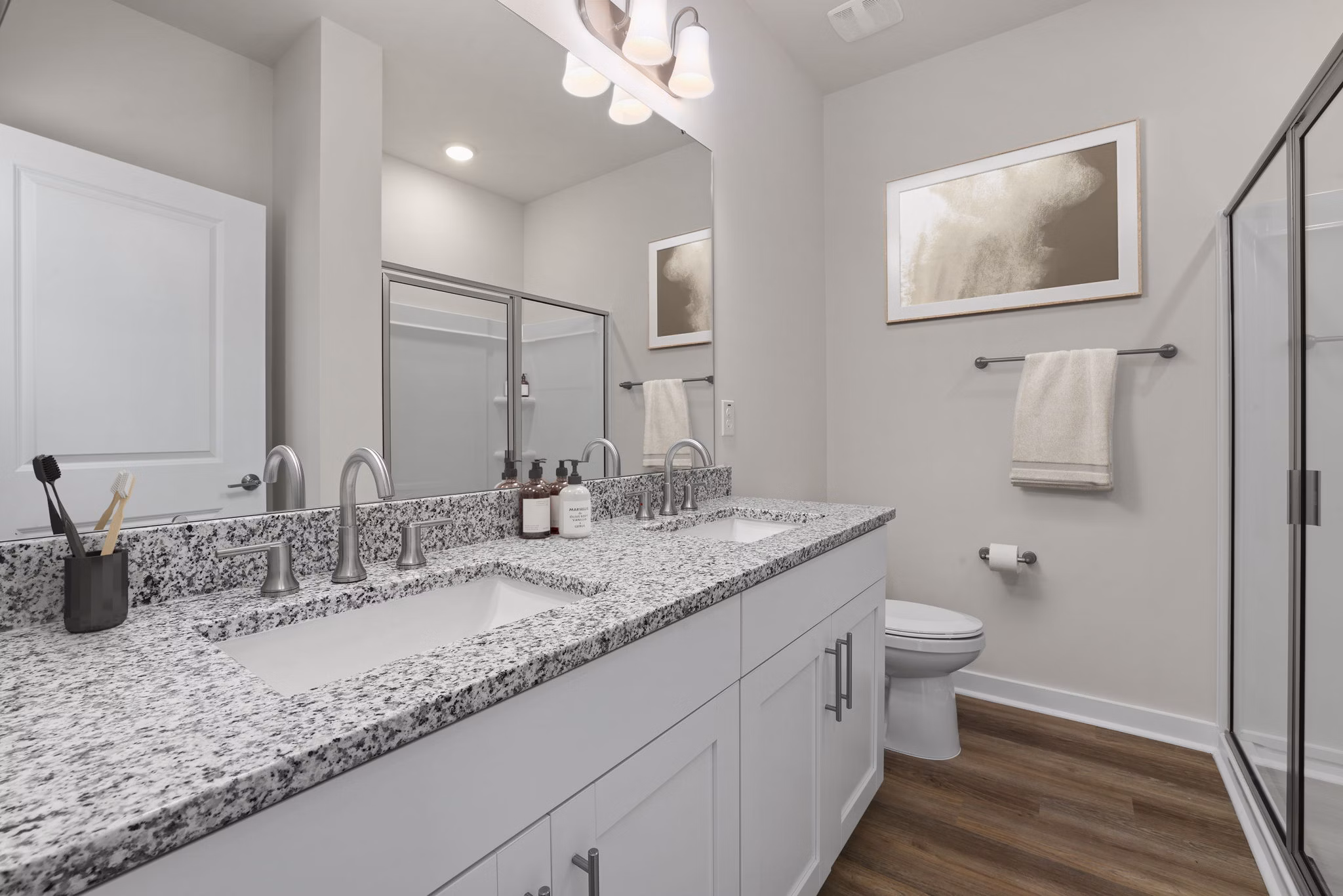 Bathroom with modern fixtures and sleek design at Gladwen Wendell Falls Apartments