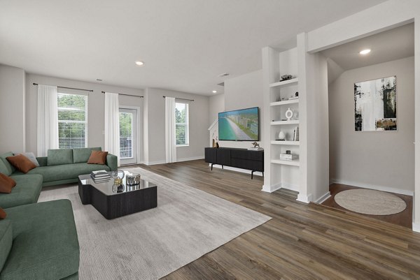 Lobby featuring contemporary design and cozy seating at Gladwen Wendell Falls Apartments