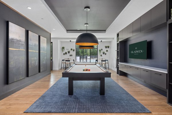 Game room featuring pool table and arcade games at Gladwen Wendell Falls Apartments
