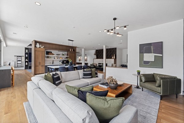 Lobby with modern seating and decor at Gladwen Wendell Falls Apartments, a luxury community