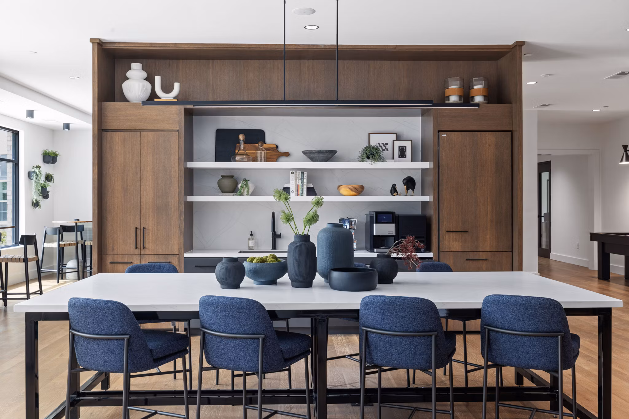 Dining area with modern furnishings at Gladwen Wendell Falls Apartments