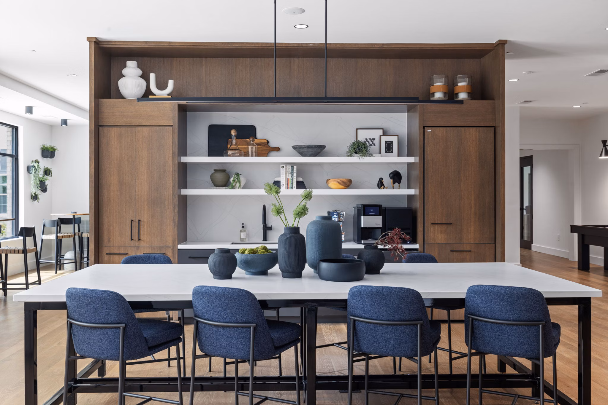 Dining area with modern furnishings at Gladwen Wendell Falls Apartments