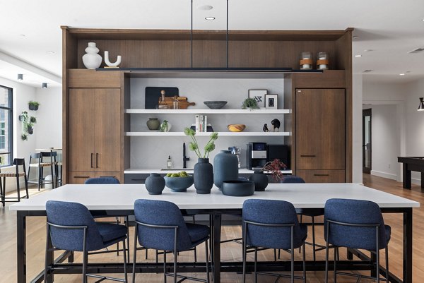 Dining area with modern furnishings at Gladwen Wendell Falls Apartments
