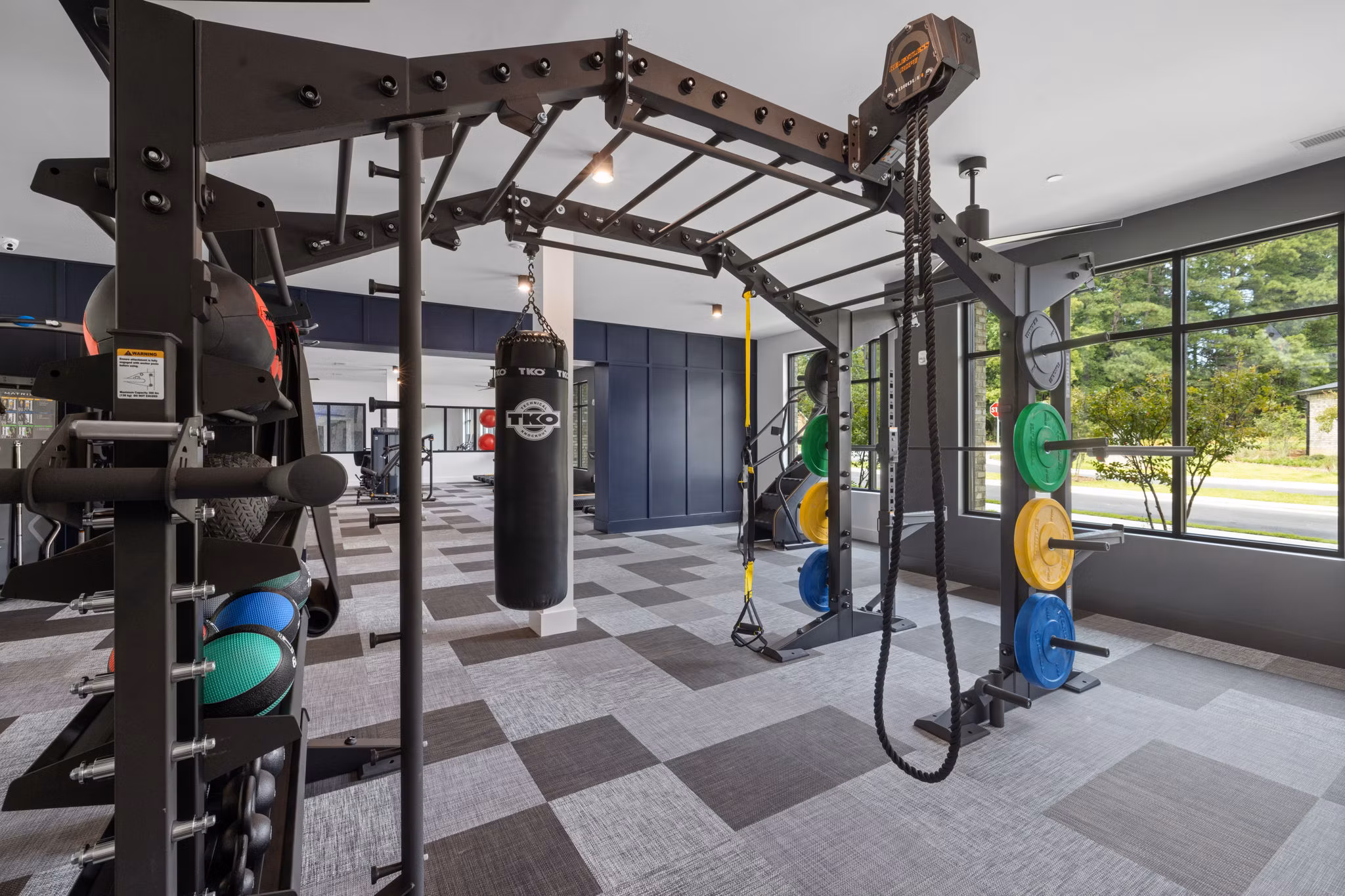 State-of-the-art fitness center with modern equipment at Gladwen Wendell Falls Apartments