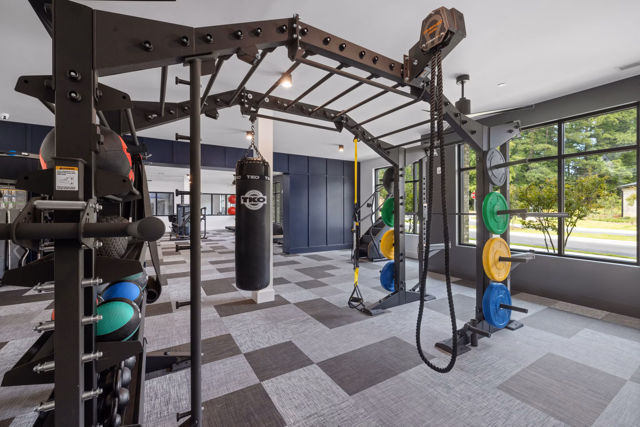 State-of-the-art fitness center with modern equipment at Gladwen Wendell Falls Apartments