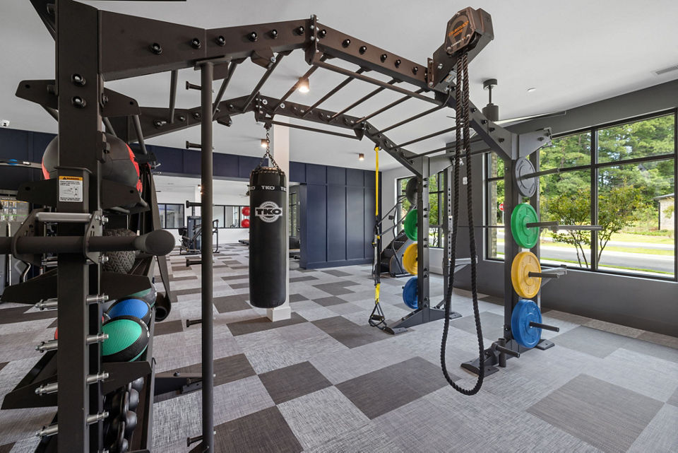State-of-the-art fitness center with modern equipment at Gladwen Wendell Falls Apartments