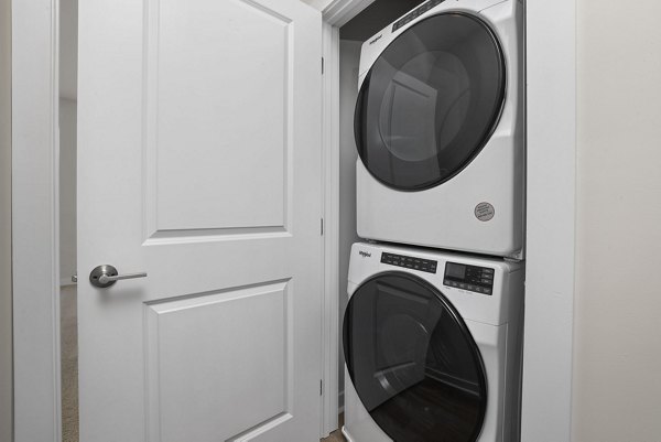 Laundry facility with energy-efficient washers and dryers at Gladwen Wendell Falls Apartments