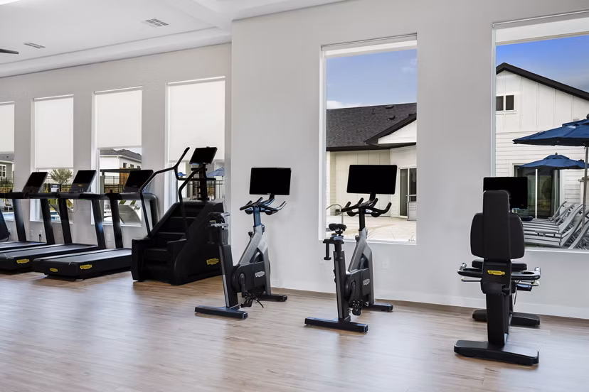 fitness center at Yardly Elm Apartments