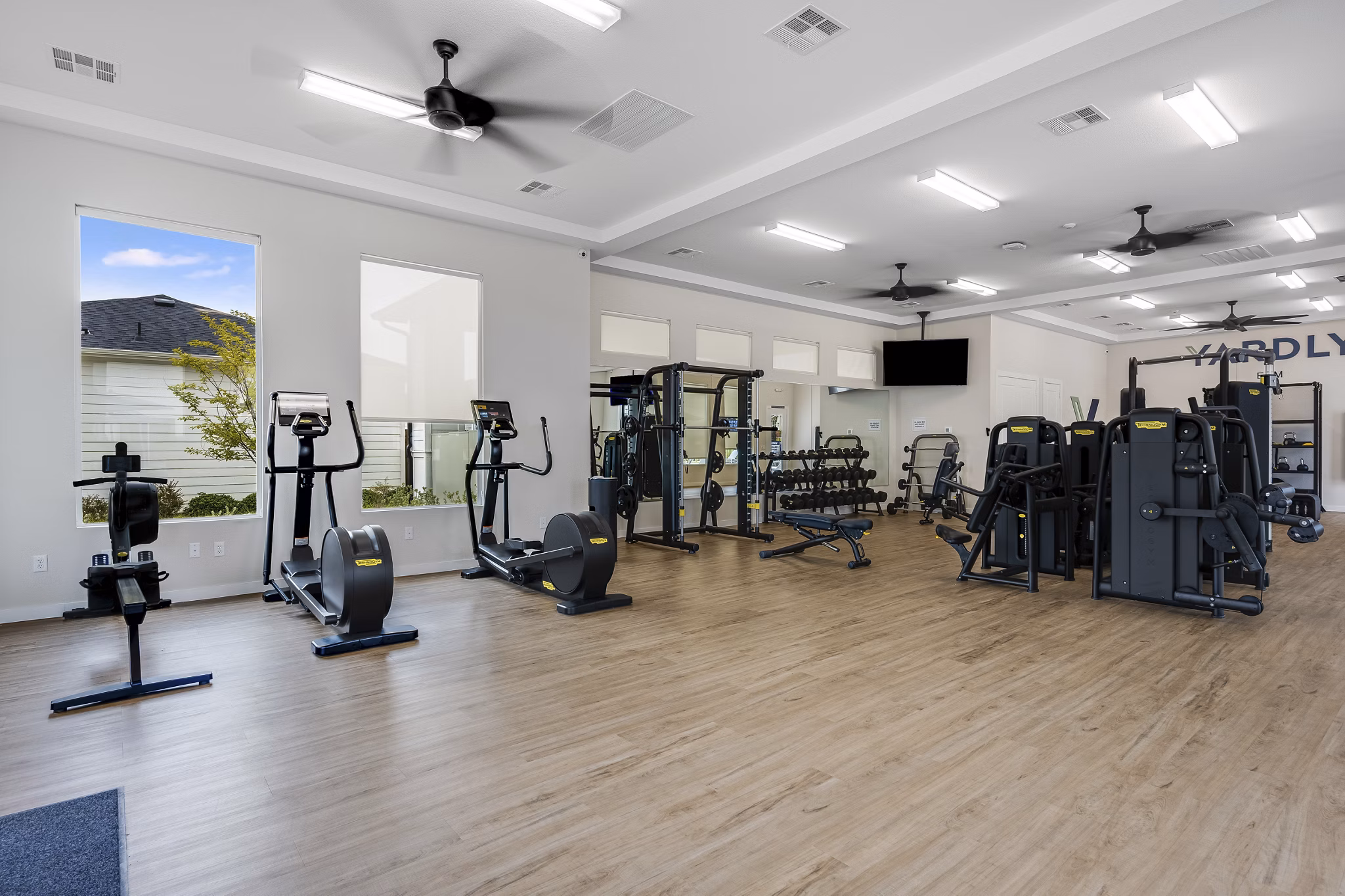 fitness center at Yardly Elm Apartments