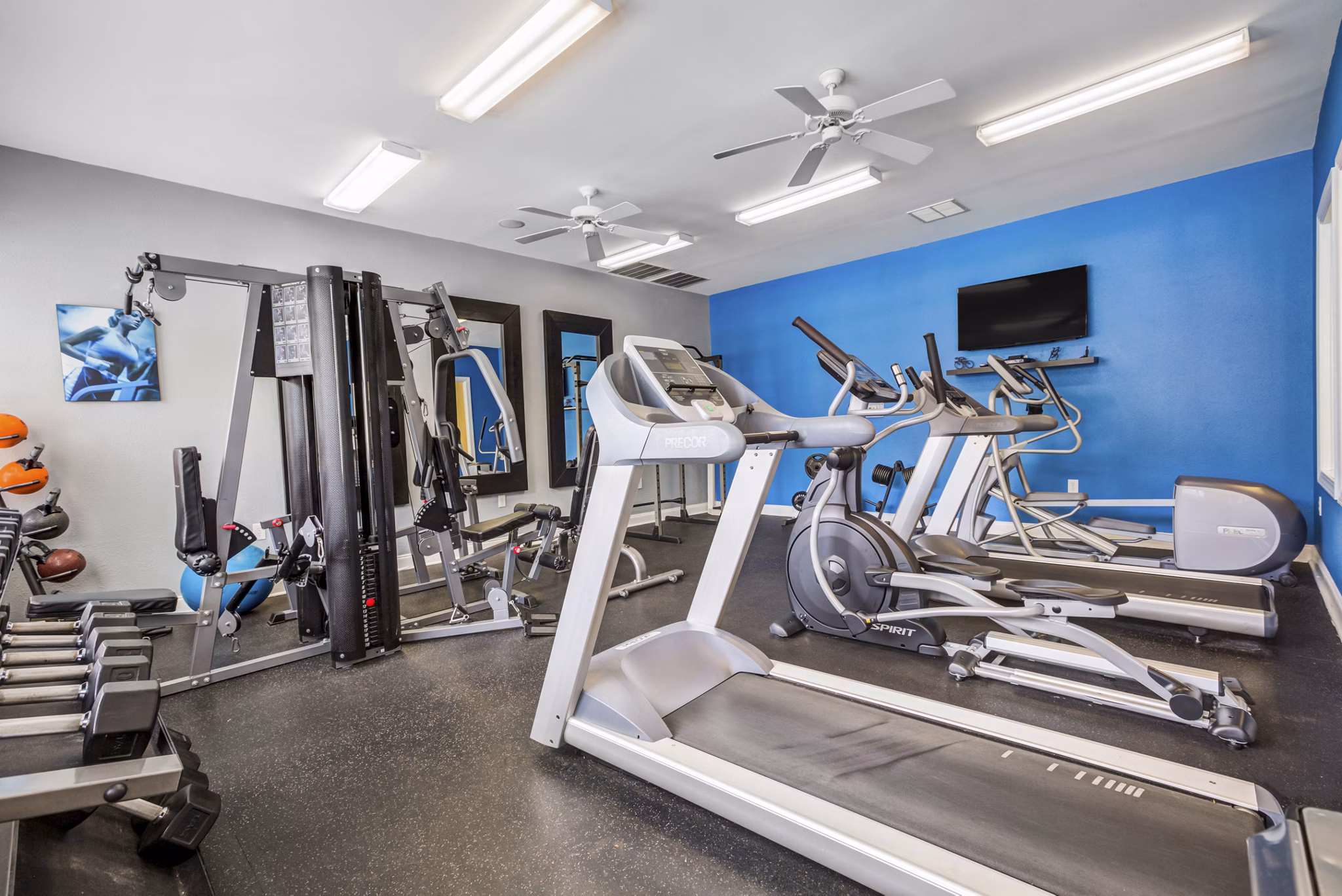 fitness center at Westmont Commons Apartments 