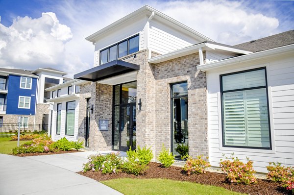 Clubhouse featuring modern design and cozy lounge areas at Windsor at Manhattan Apartments