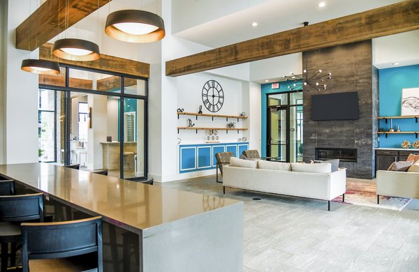 Clubhouse with modern design and comfortable seating at Windsor at Manhattan Apartments
