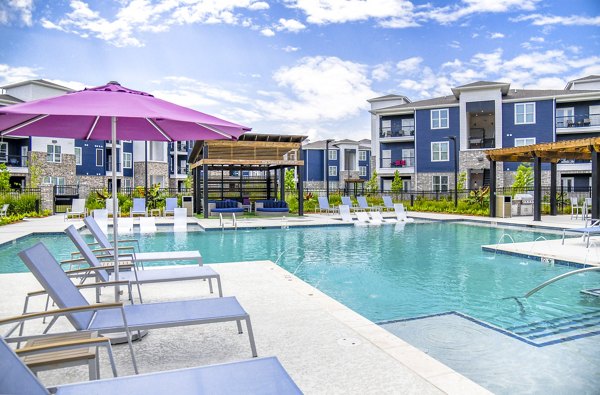 Rooftop pool offering skyline views at Windsor at Manhattan Apartments