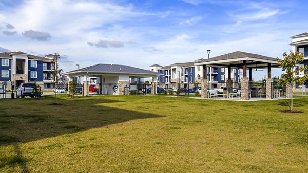 Off-leash dog park at Windsor at Manhattan Apartments, perfect for pet-friendly luxury living in a vibrant community