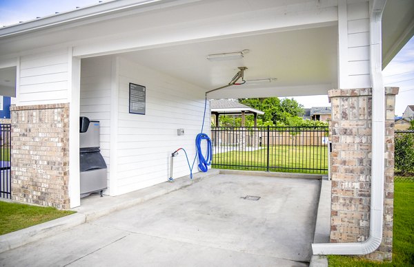 Convenient car wash station at Windsor at Manhattan Apartments, catering to resident needs with state-of-the-art facilities
