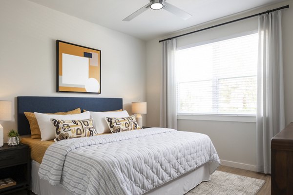 Spacious bedroom with modern decor at Broadstone Baybrook Apartments