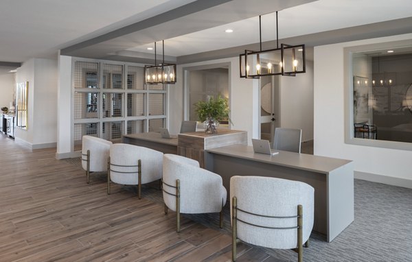 Clubhouse at Broadstone Baybrook Apartments: Modern design with ample seating and entertainment areas for social gatherings