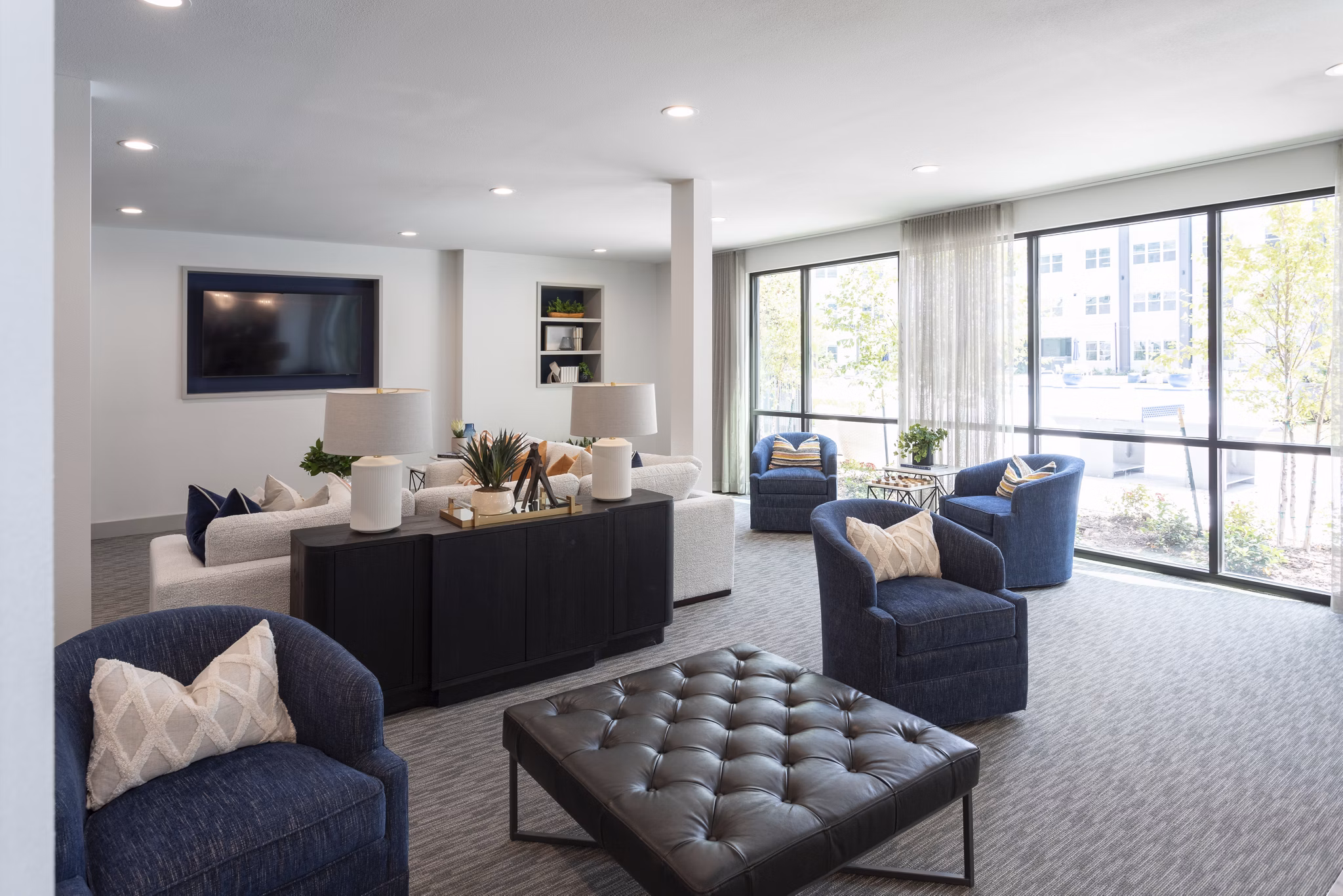 Clubhouse featuring modern dÃ©cor and seating areas at Broadstone Baybrook Apartments