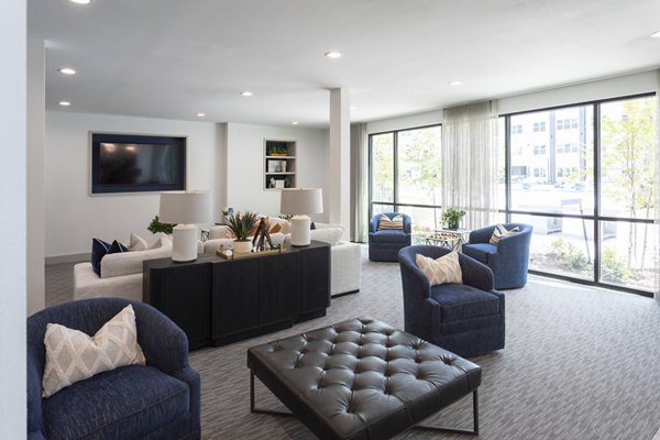 Clubhouse featuring modern dÃ©cor and seating areas at Broadstone Baybrook Apartments