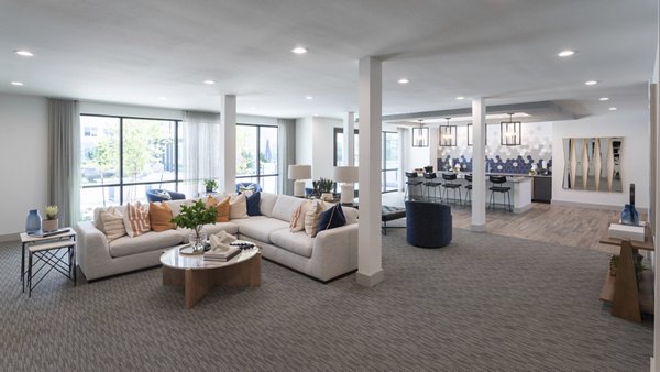 Elegant clubhouse with game room and lounge at Broadstone Baybrook Apartments