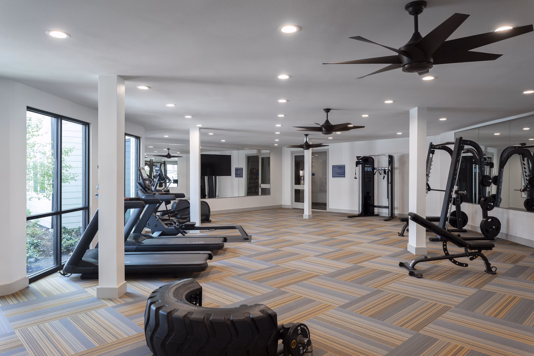 Fully-equipped fitness center with modern machines at Broadstone Baybrook Apartments
