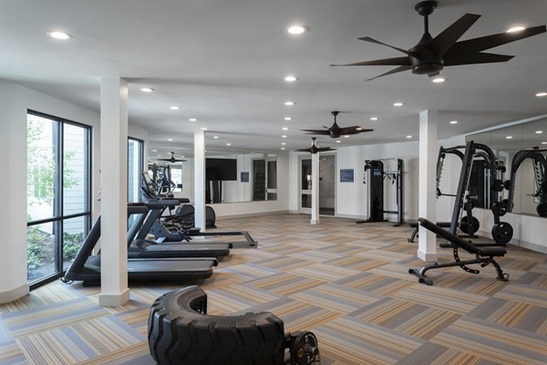 Fully-equipped fitness center with modern machines at Broadstone Baybrook Apartments
