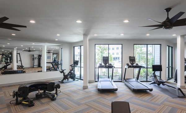 State-of-the-art fitness center with modern equipment at Broadstone Baybrook Apartments