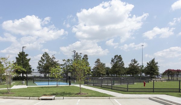 Outdoor sport court for basketball and tennis at Broadstone Baybrook Apartments