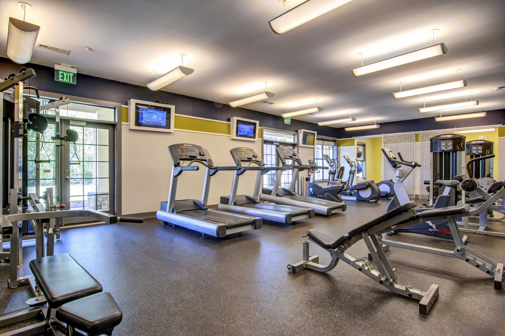fitness center at The Peak Apartments