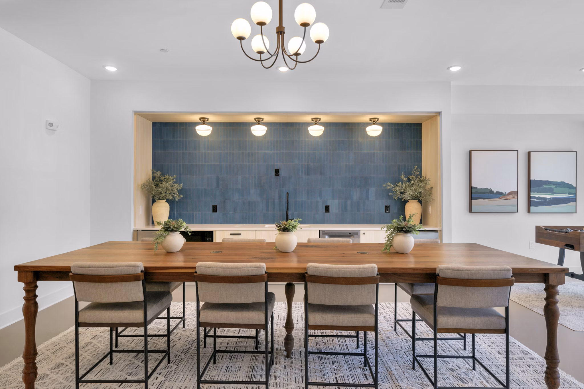 Modern clubhouse with stylish seating at Alexan Research Park Apartments