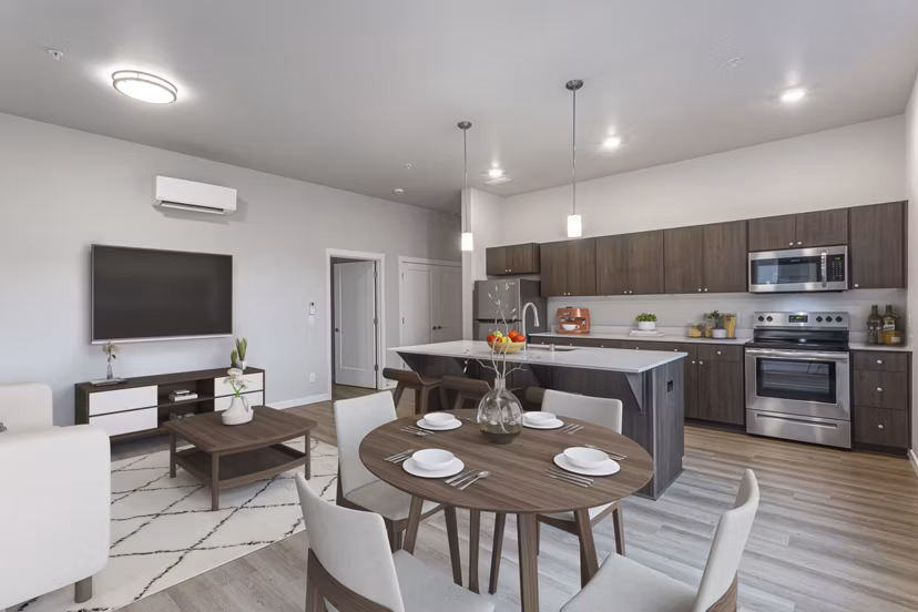 Dining area with elegant decor and modern lighting at The Farmstead Apartments, a Greystar luxury property in a serene neighborhood