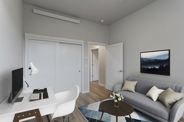 Cozy kitchen with modern stainless steel appliances in The Farmstead Apartments