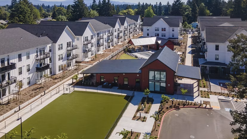 The Farmstead Apartments: Scenic view of lush green landscape and modern architecture, enhancing luxury living experience