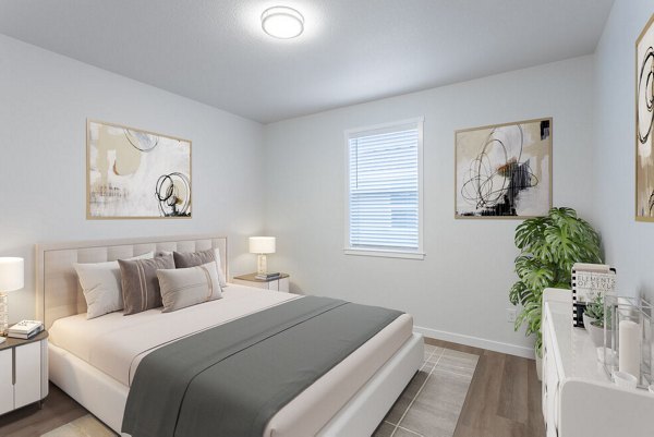 Elegant bedroom with modern furnishings at Villas at 28th Apartments