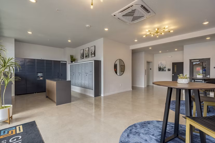 Luxurious clubhouse with modern furnishings at Villas at 28th Apartments, ideal for social gatherings and community events