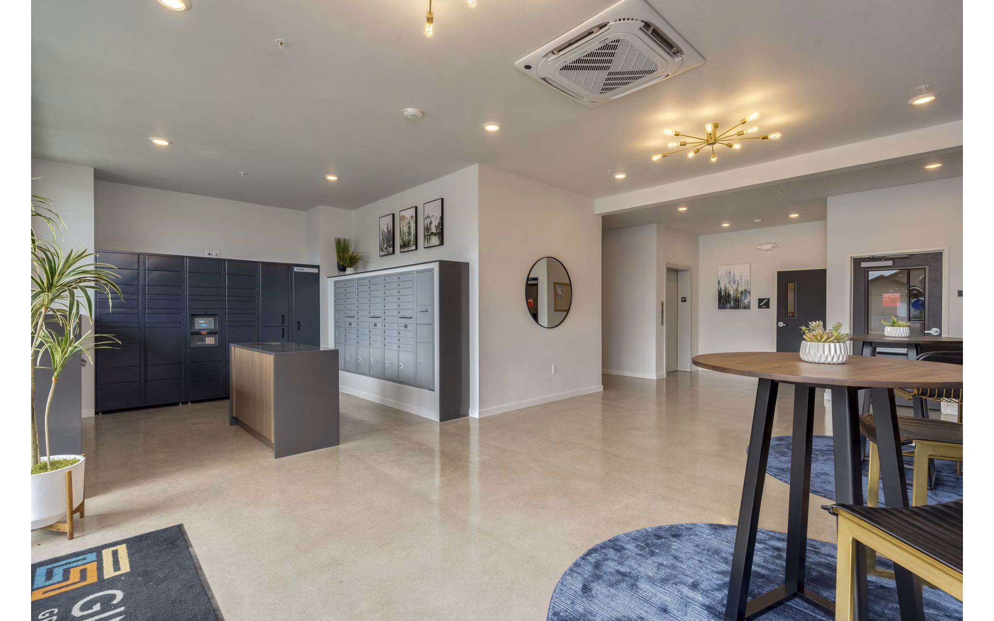 Luxurious clubhouse with modern furnishings at Villas at 28th Apartments, ideal for social gatherings and community events