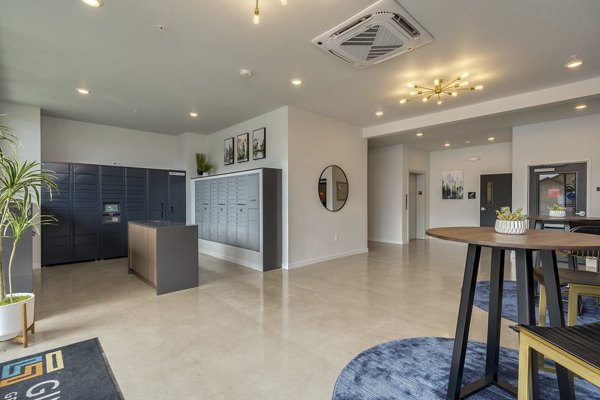 Luxurious clubhouse with modern furnishings at Villas at 28th Apartments, ideal for social gatherings and community events