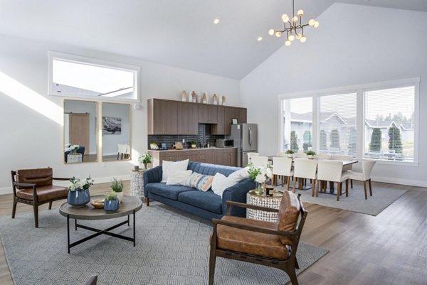 Elegant clubhouse featuring modern decor and seating at Villas at 28th Apartments
