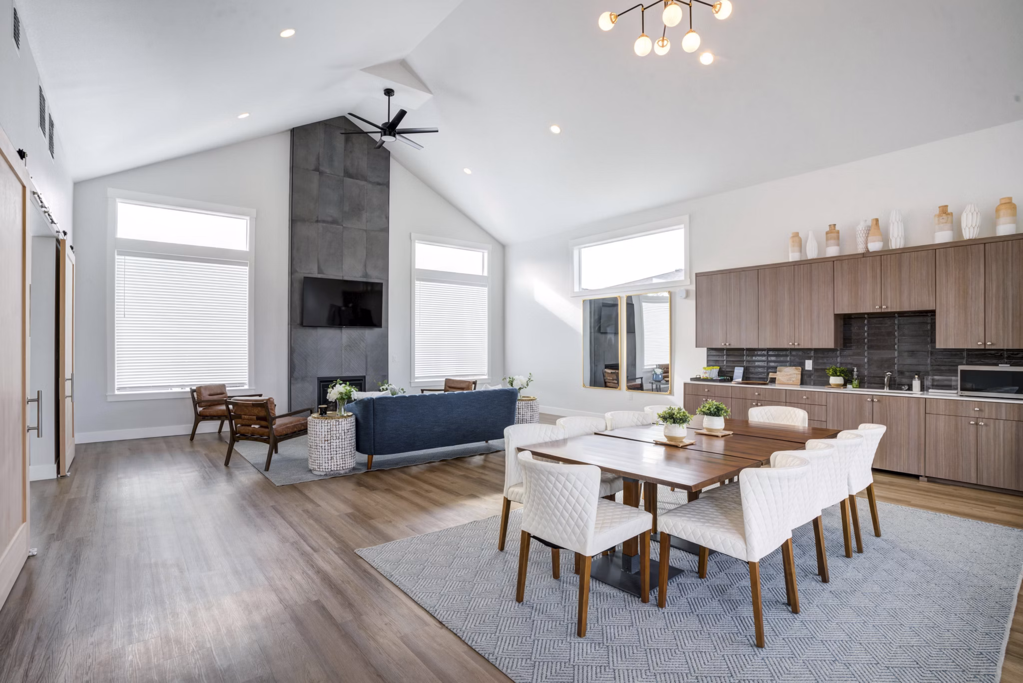 Clubhouse with contemporary design at Villas at 28th Apartments, featuring spacious seating and modern dÃ©cor