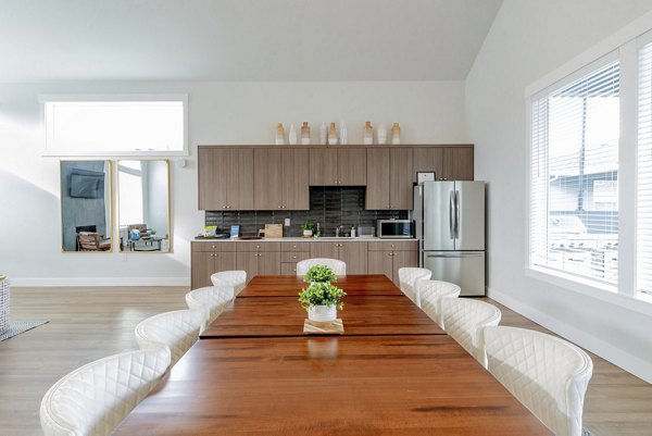 Clubhouse offering modern amenities at Villas at 28th Apartments, featuring cozy seating areas and a stylish design