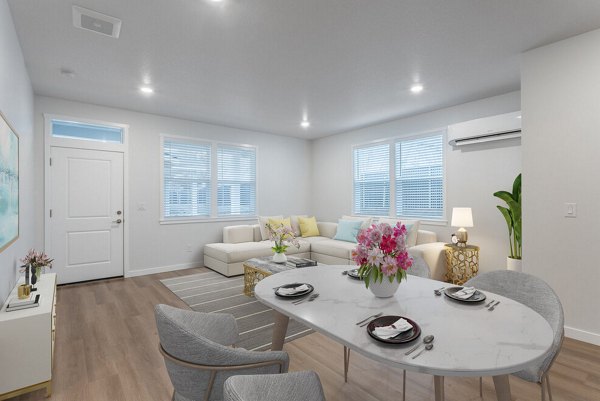 Dining area featuring modern furnishings and stylish decor at Villas at 28th Apartments luxury community