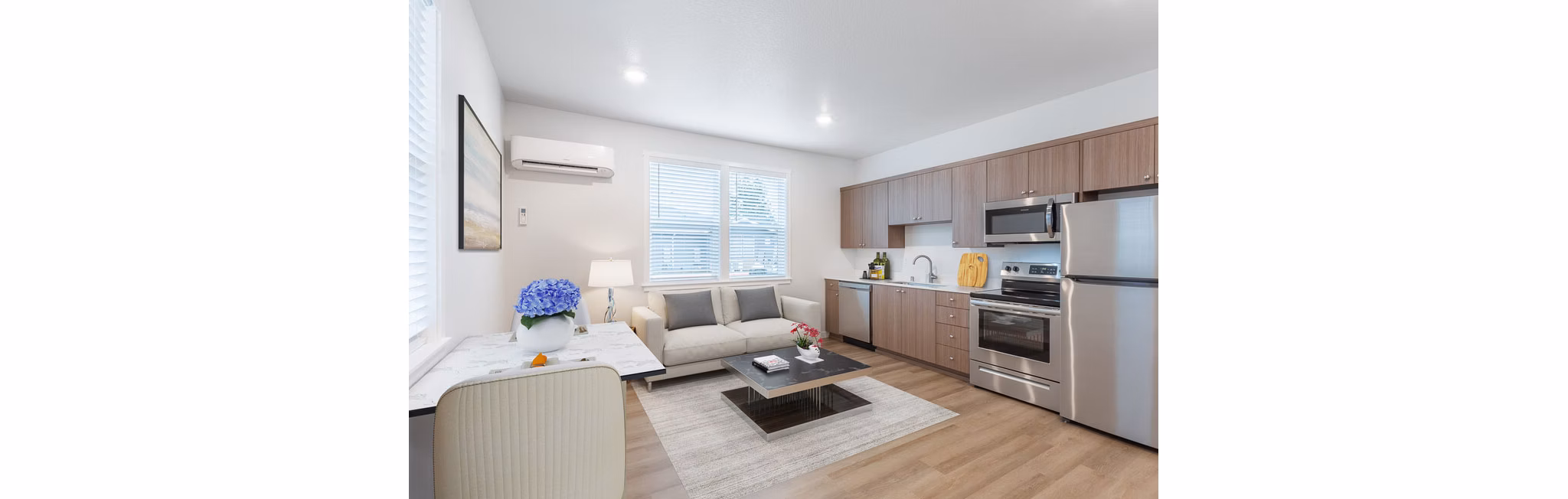 Spacious living room with modern decor at Villas at 28th Apartments