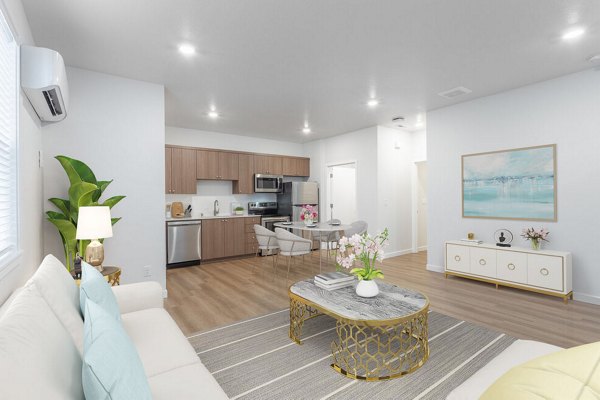 Spacious living room with contemporary furnishings in Villas at 28th Apartments