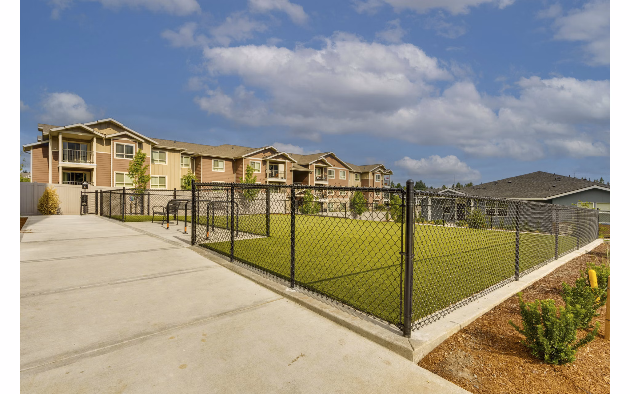 Dog park with agility course at Villas at 28th Apartments, a pet-friendly luxury community