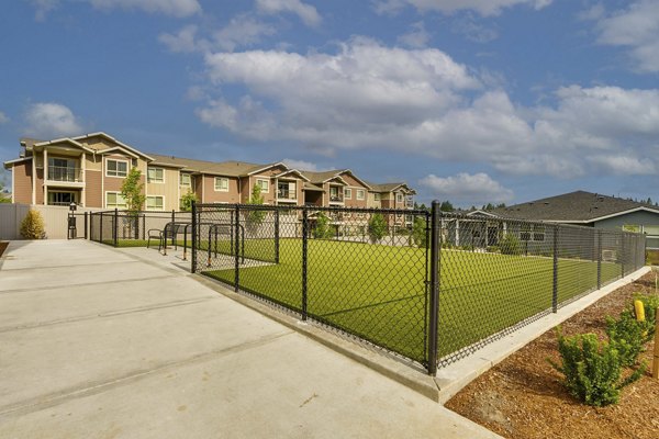Dog park with agility course at Villas at 28th Apartments, a pet-friendly luxury community